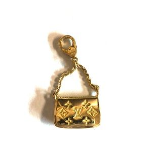 Louis Vuitton 18kt purse charm/pendant